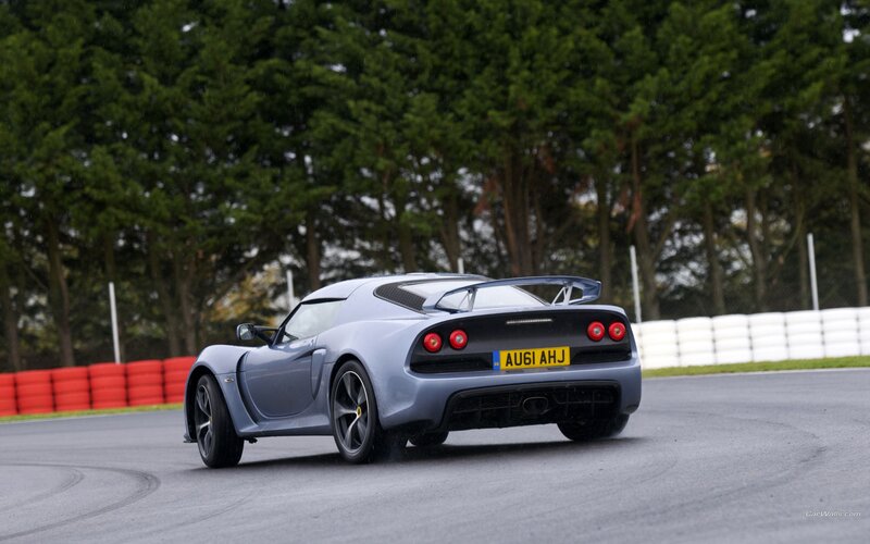 silver sports car on racetrack