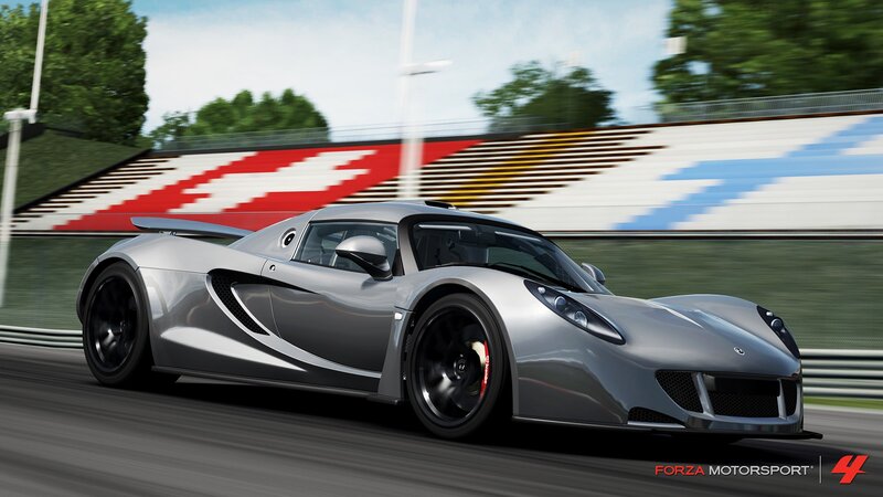 silver sports car on racetrack