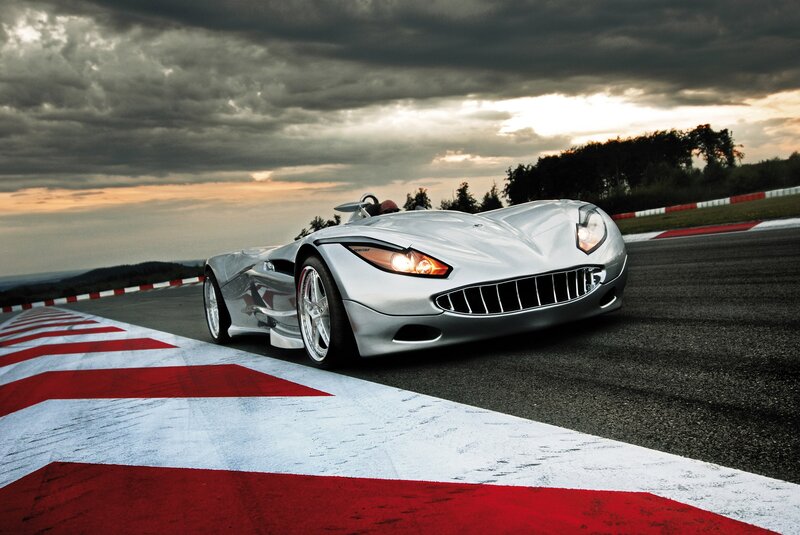 Silver sports car on racetrack