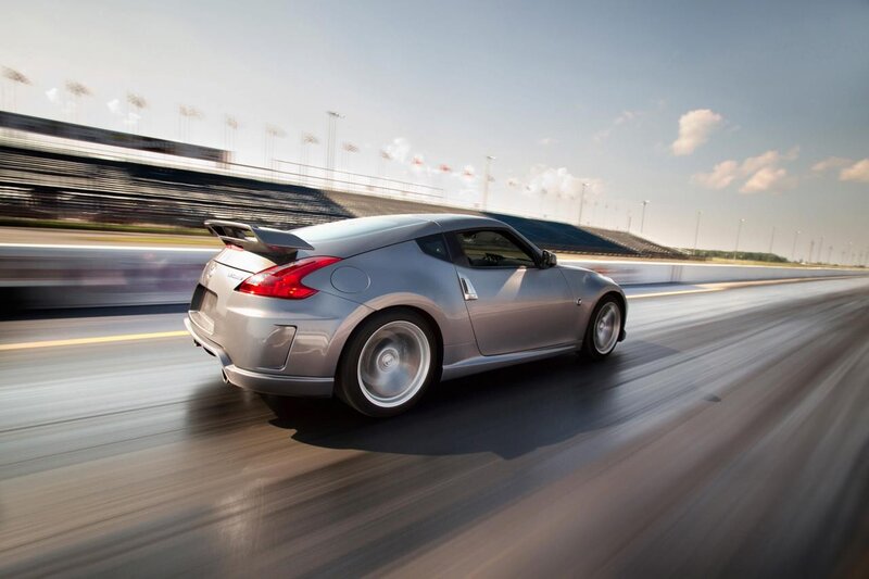 Silver sports car on racetrack