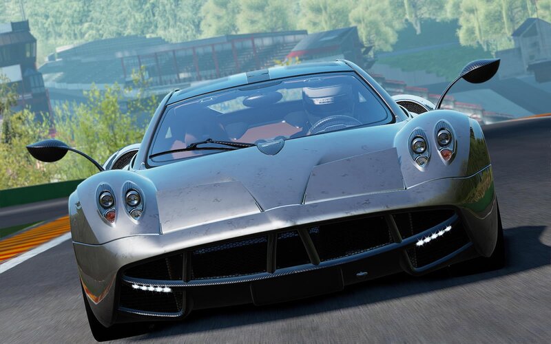 silver sports car on racetrack