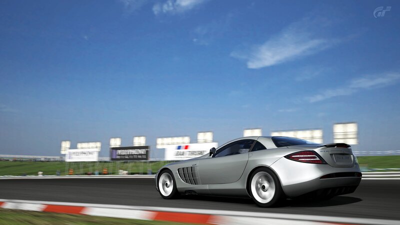 Silver sports car on racetrack