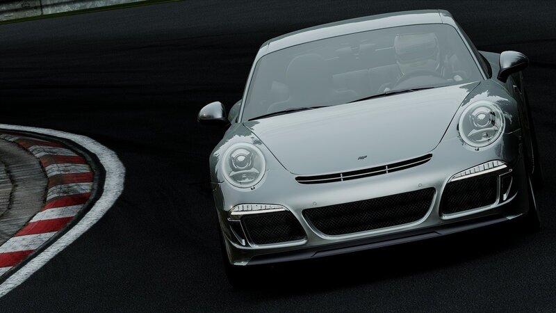 silver sports car on racetrack