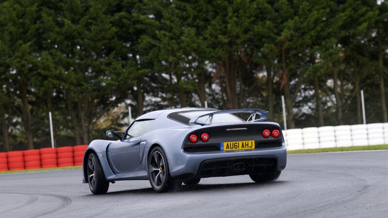 silver sports car on racetrack