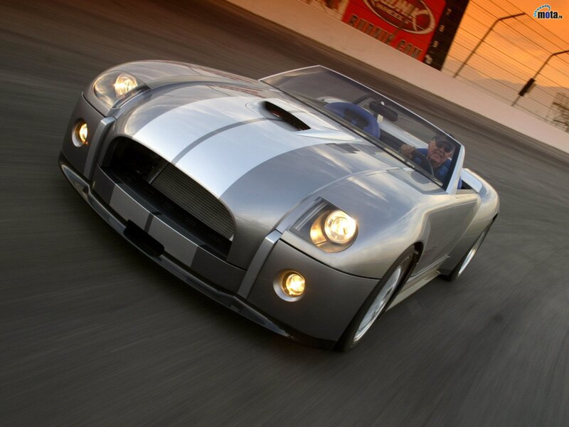 silver sports car on racetrack