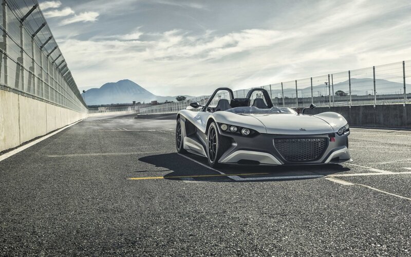Silver sports car on racetrack