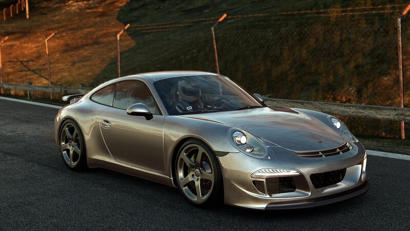 silver sports car on racetrack
