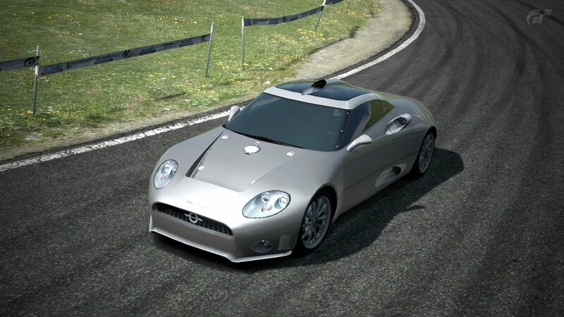 silver sports car on racetrack