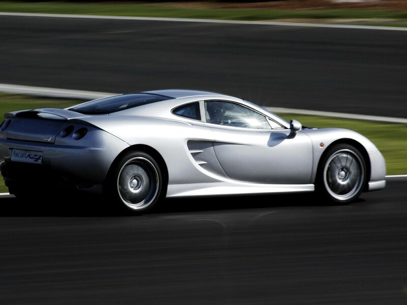 Silver sports car on racetrack