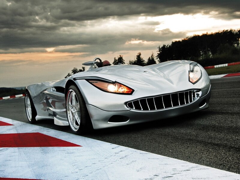 Silver sports car on racetrack