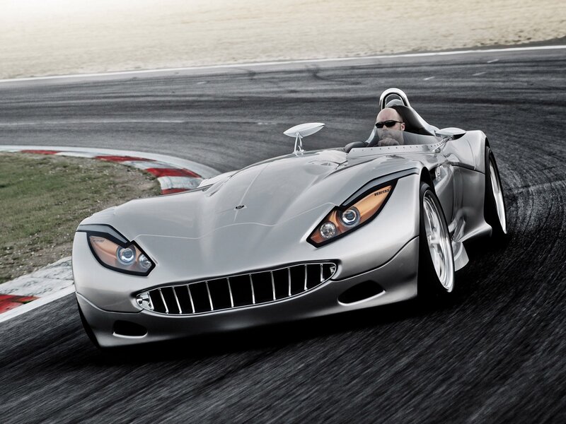 Silver sports car on racetrack