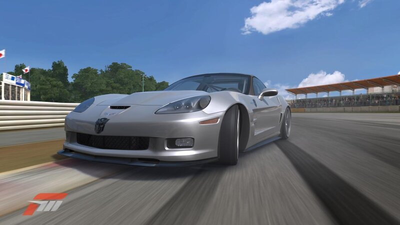 Silver sports car on racetrack