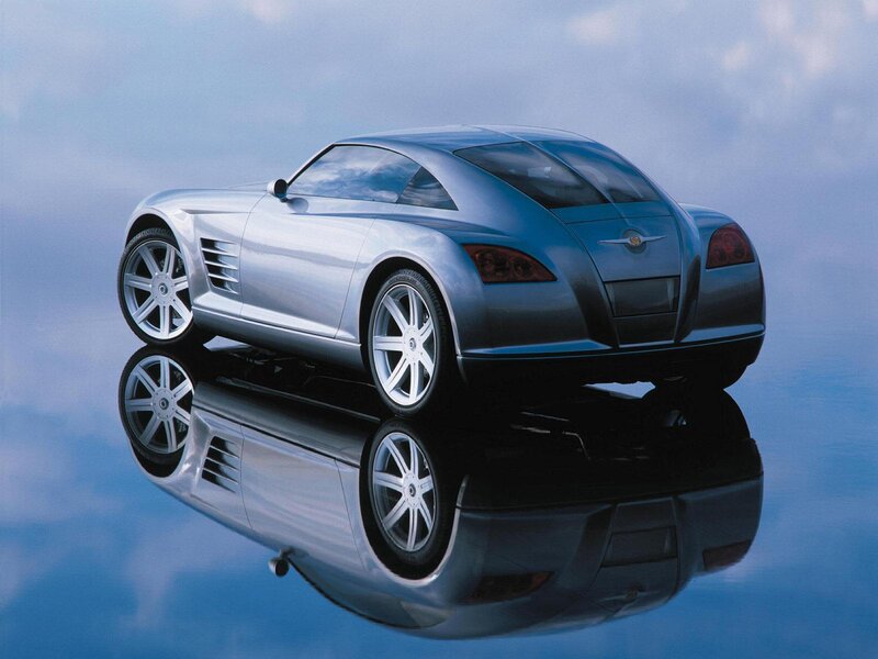 Silver sports car on reflective surface