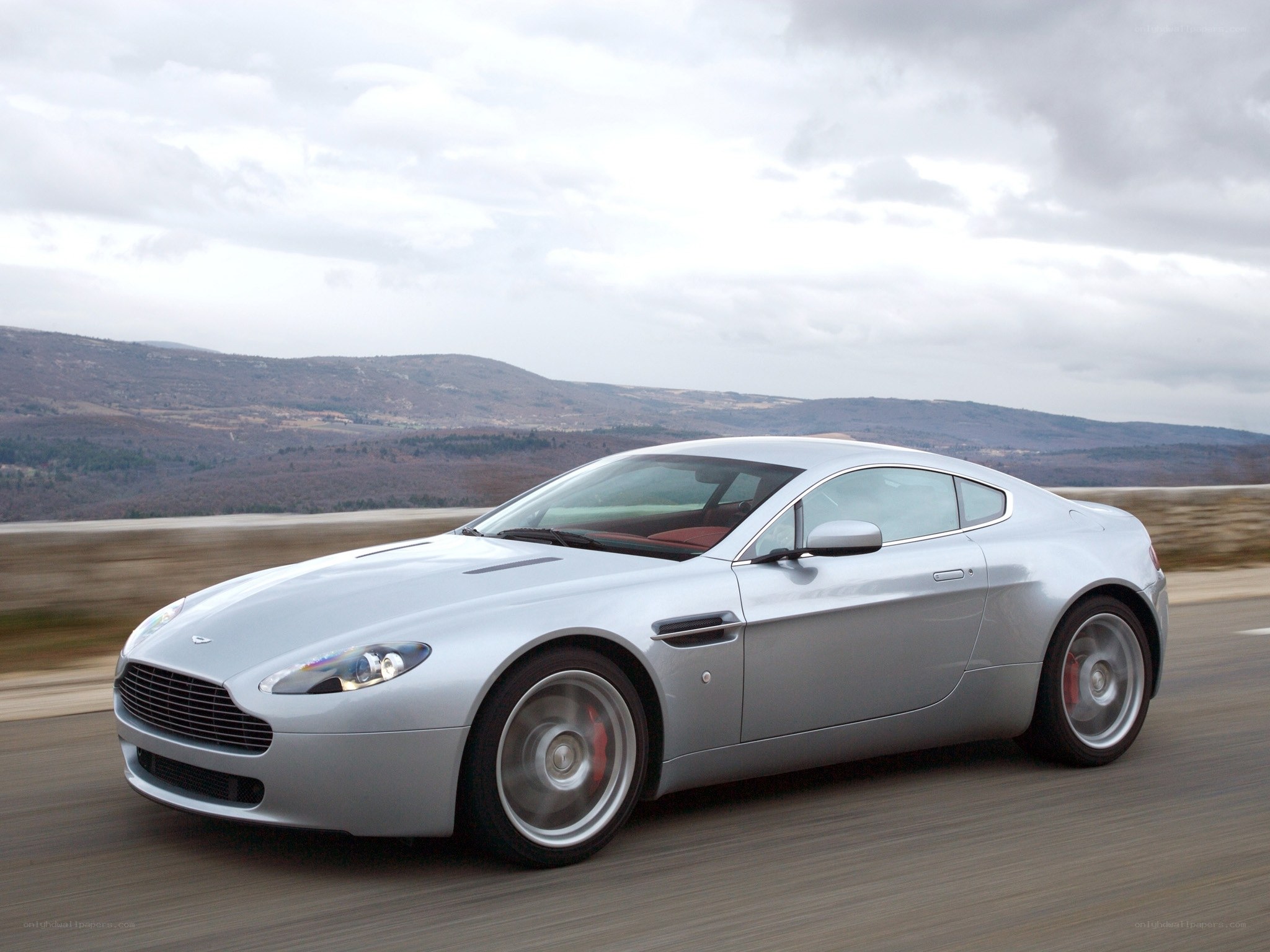 silver sports car on road