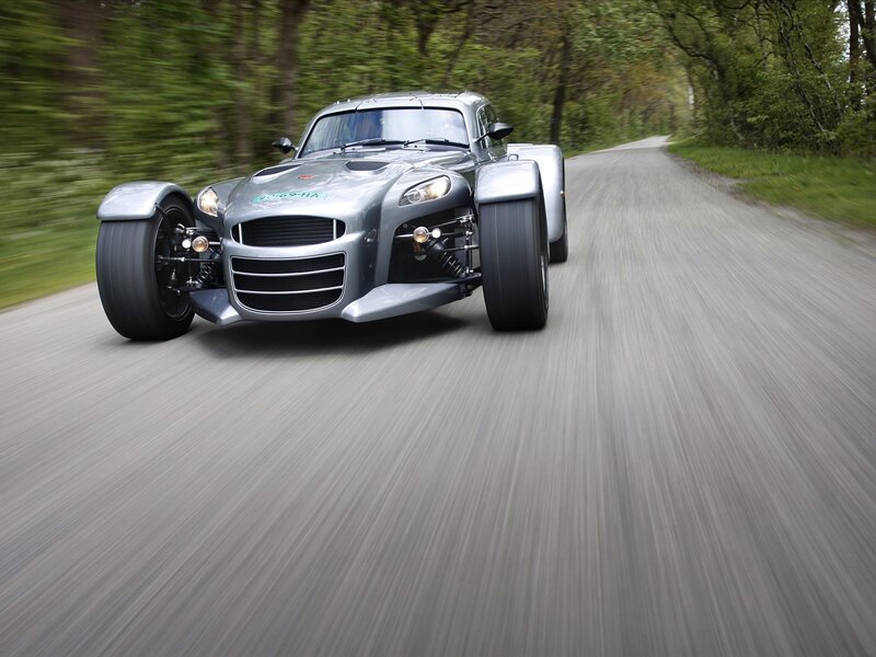 silver sports car on road