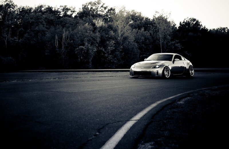 silver sports car on road
