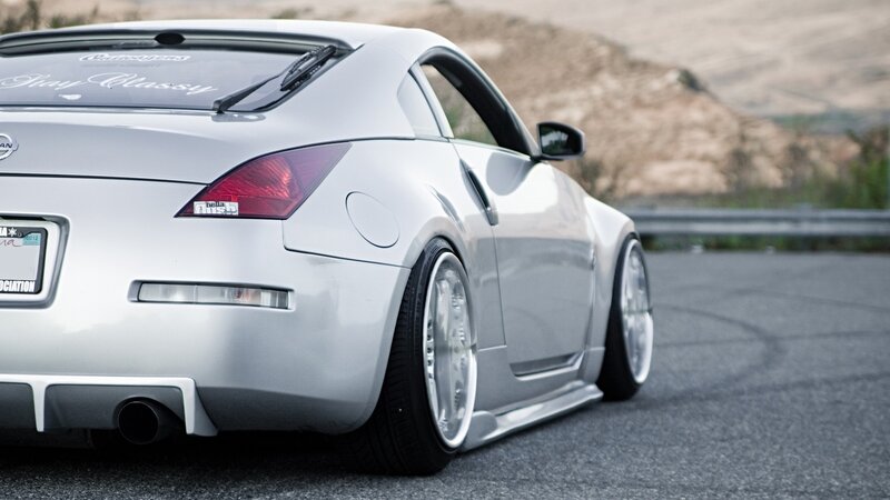 silver sports car on road