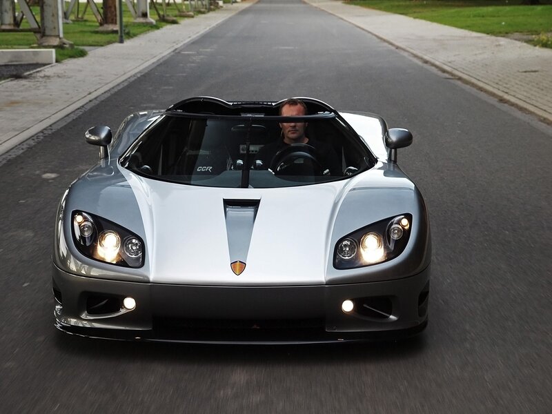 silver sports car on road
