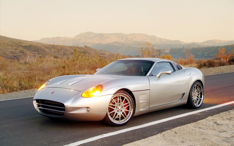 silver sports car on road