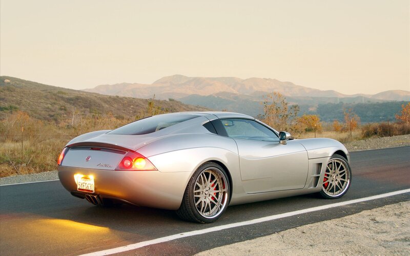 silver sports car on road