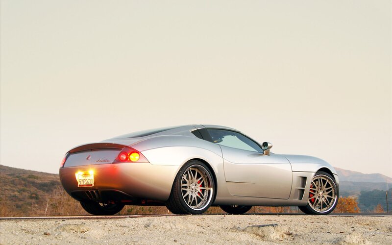 silver sports car on road