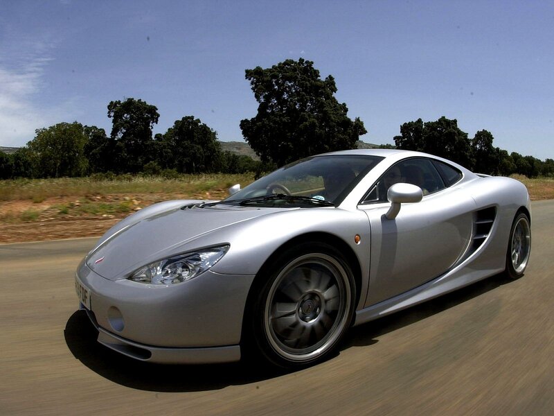 silver sports car on road