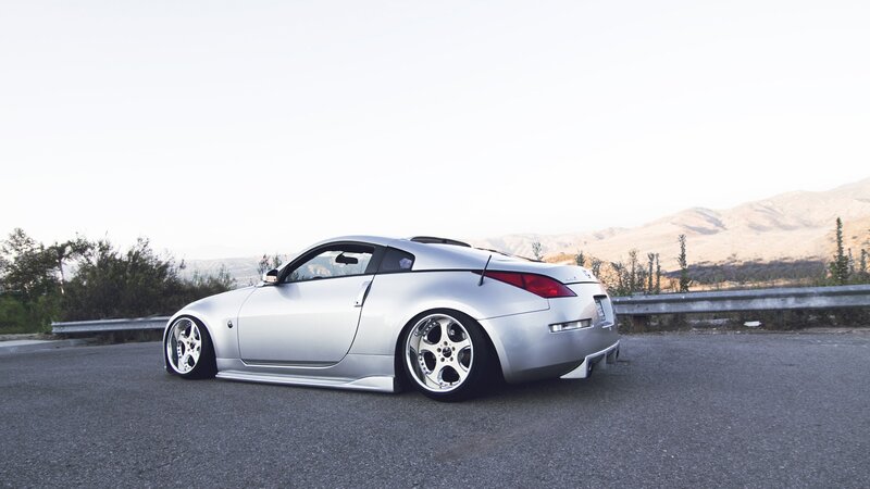 silver sports car on road