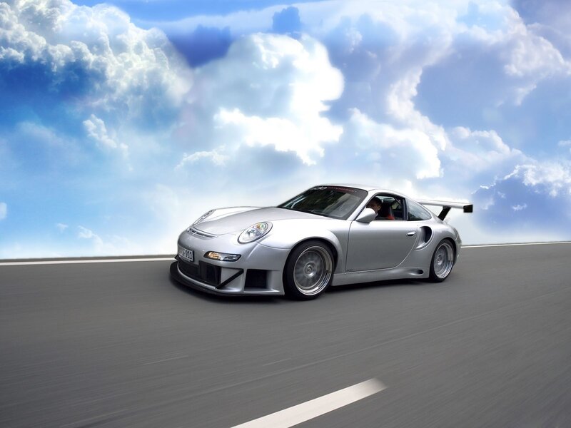 silver sports car on road
