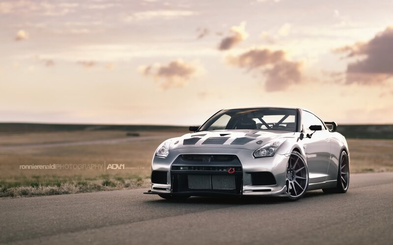 silver sports car on road
