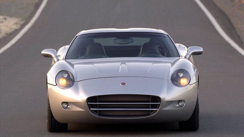 silver sports car on road