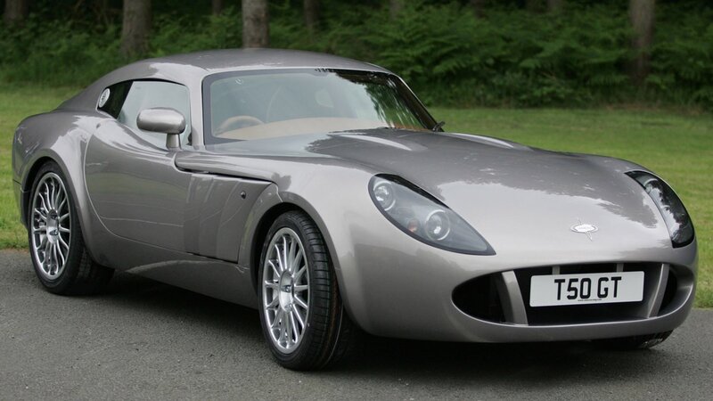 silver sports car on road