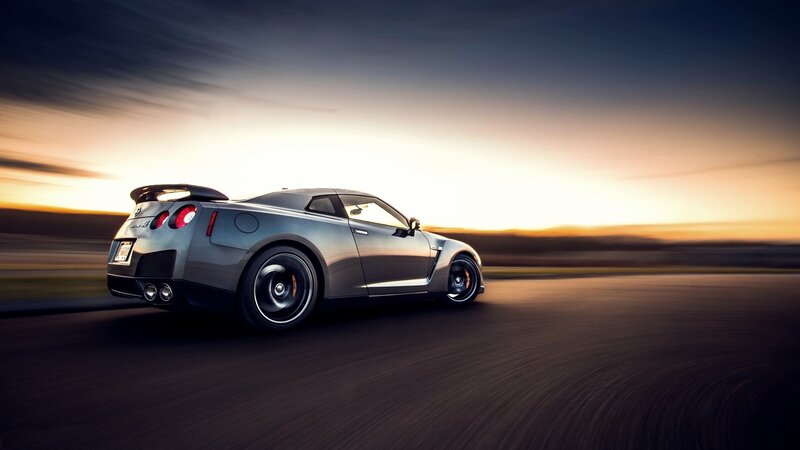 silver sports car on road
