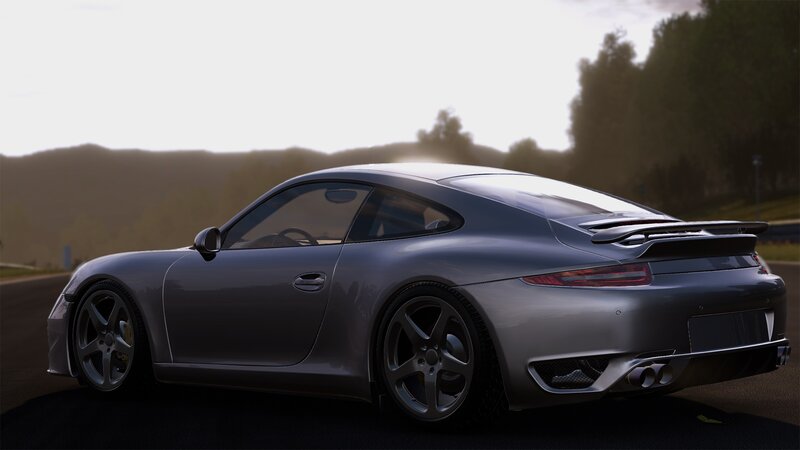 silver sports car on road