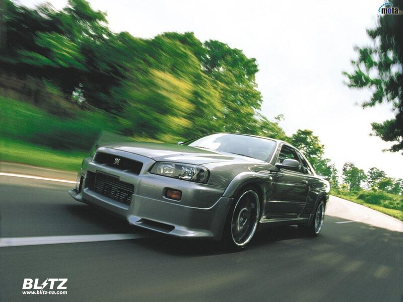silver sports car on road