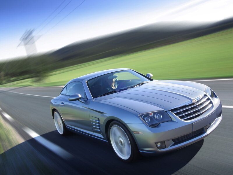 silver sports car on road