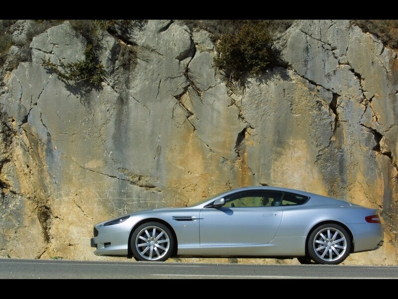 silver sports car on road