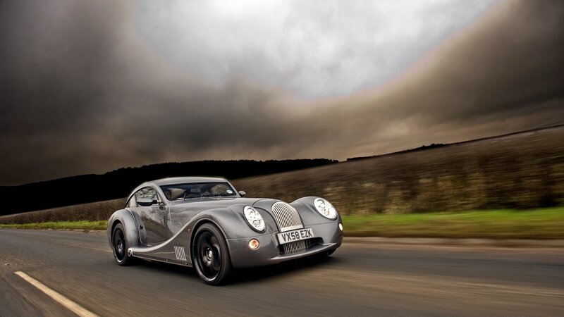 silver sports car on road