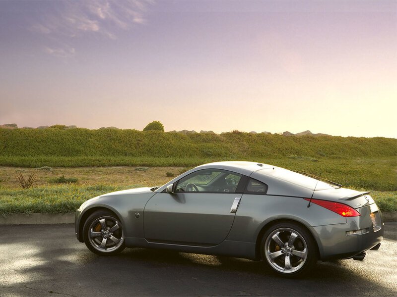 silver sports car on road