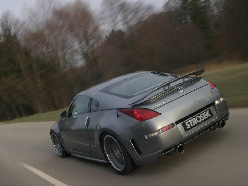 silver sports car on road