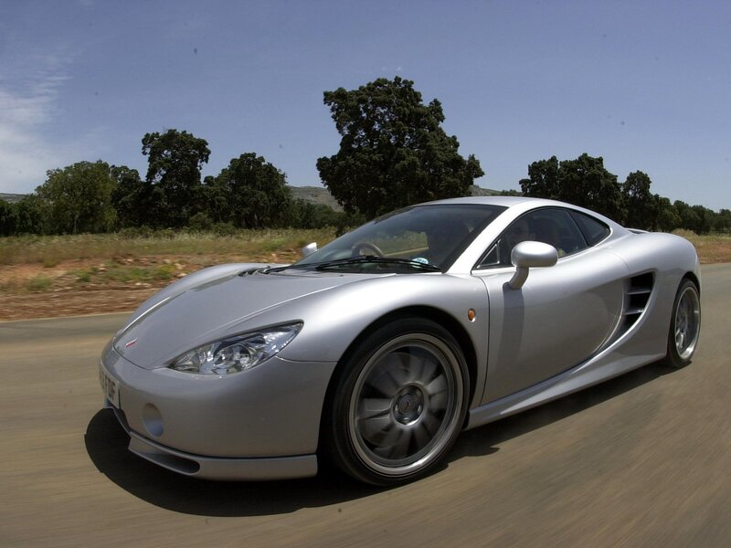 silver sports car on road