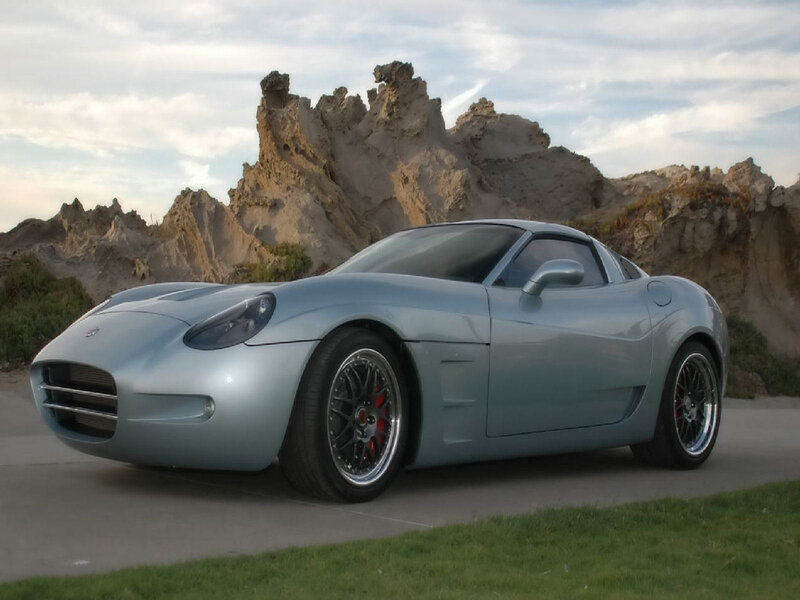 silver sports car on road