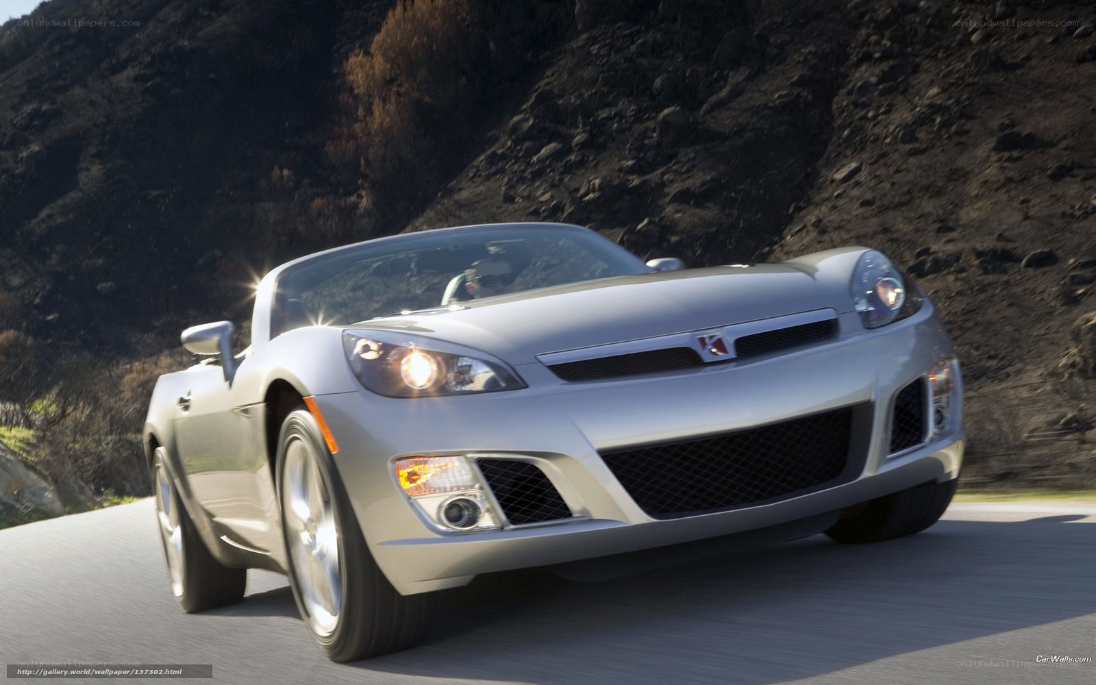 silver sports car on road