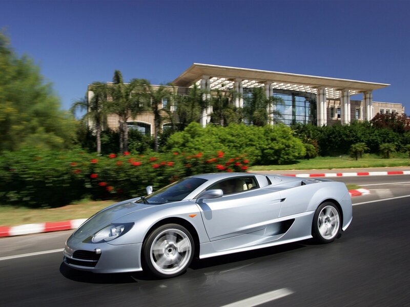 silver sports car on road