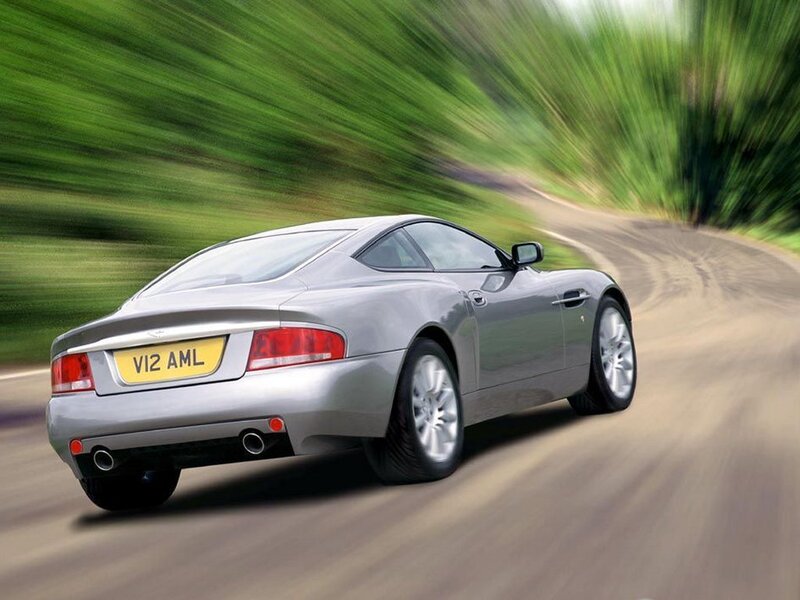 silver sports car on road