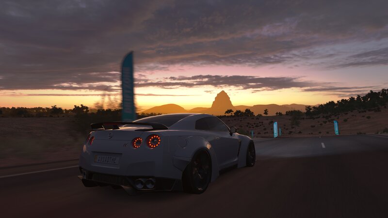 Silver Sports Car on Road — Gray, Dramatic
