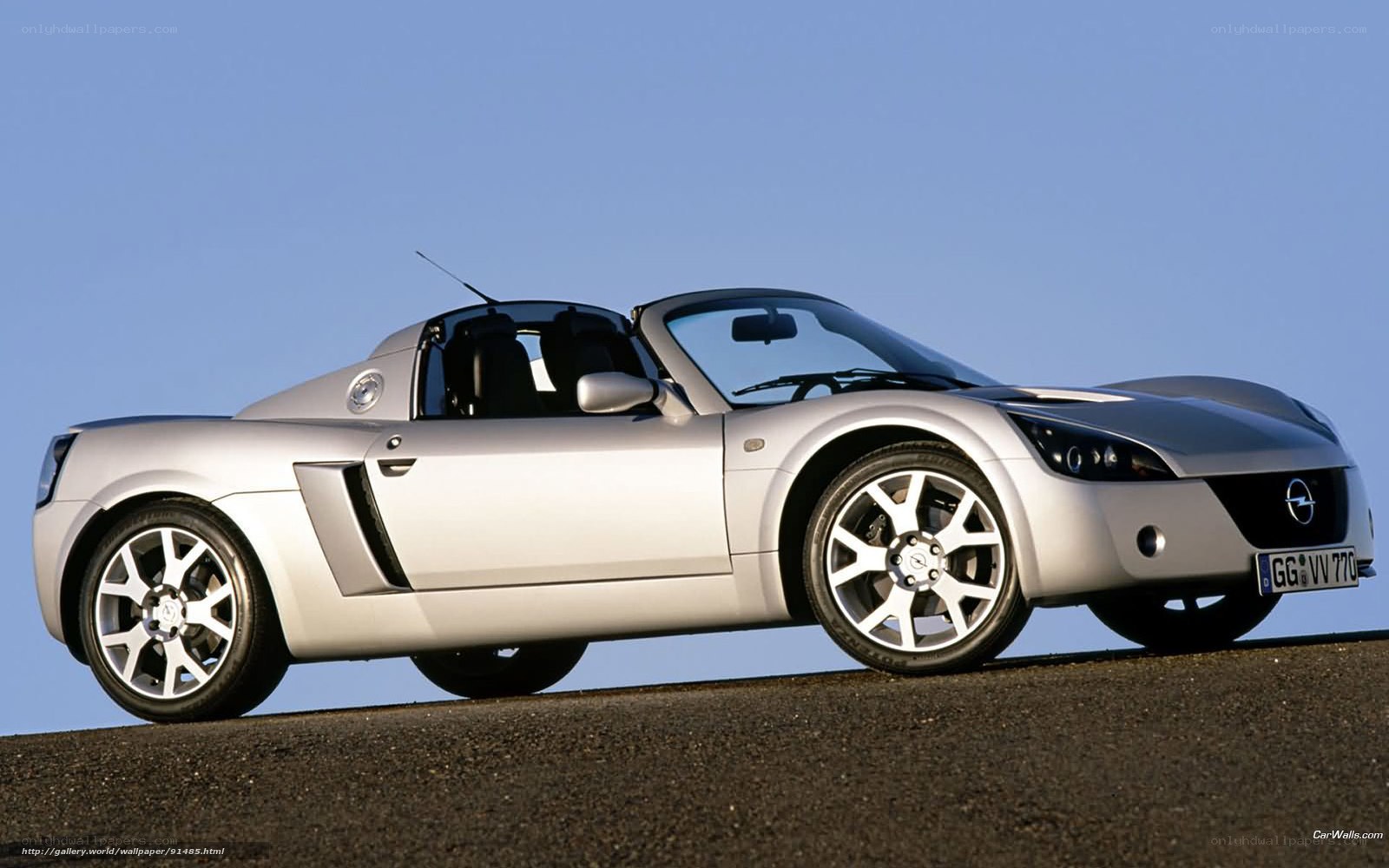 silver sports car on road