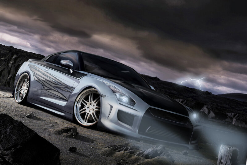 Silver sports car on rocky terrain