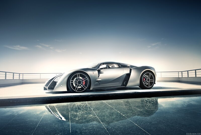 silver sports car on rooftop