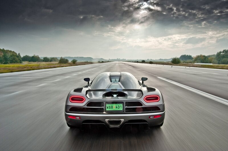 silver sports car on runway