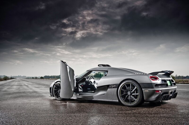 silver sports car on runway